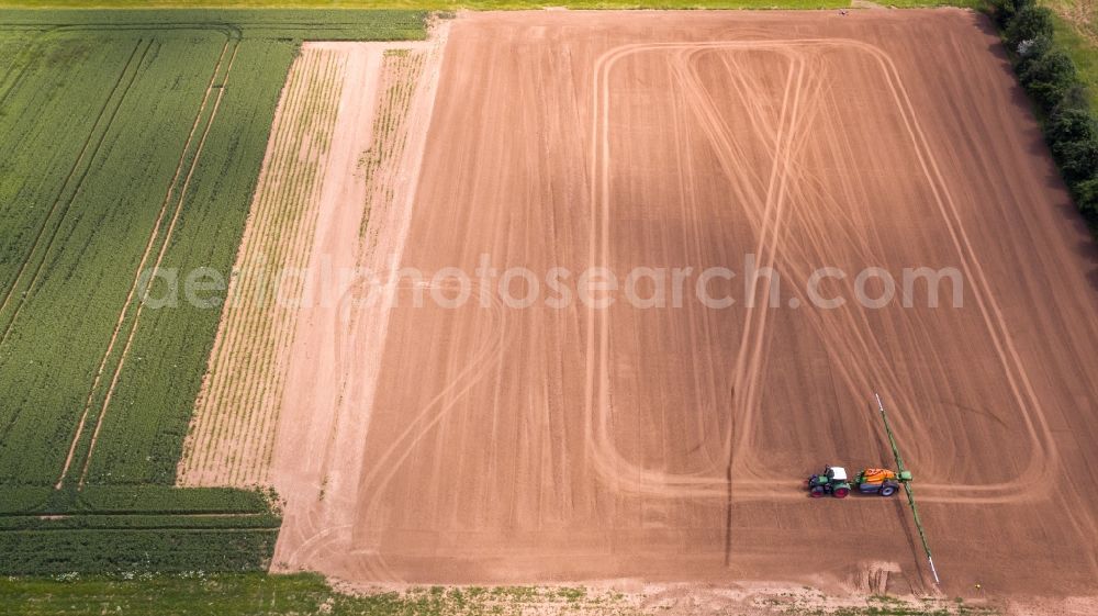 Aerial photograph Arzberg - Farm equipment used for fertilizing fields in Arzberg in the state Saxony, Germany