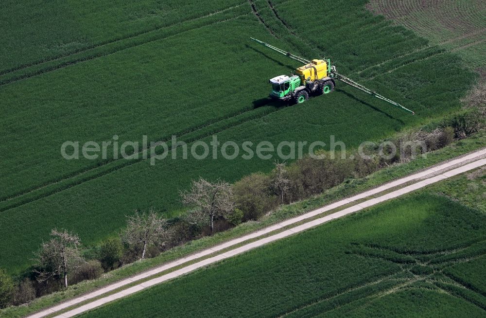 Aerial photograph Beichlingen - Farm equipment used for fertilizing fields in Beichlingen in the state Thuringia, Germany