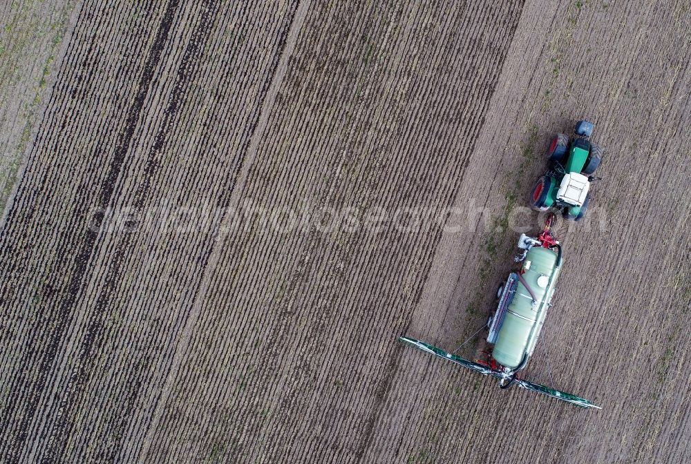 Aerial photograph Sieversdorf - Farm equipment used for fertilizing fields in Sieversdorf in the state Brandenburg, Germany