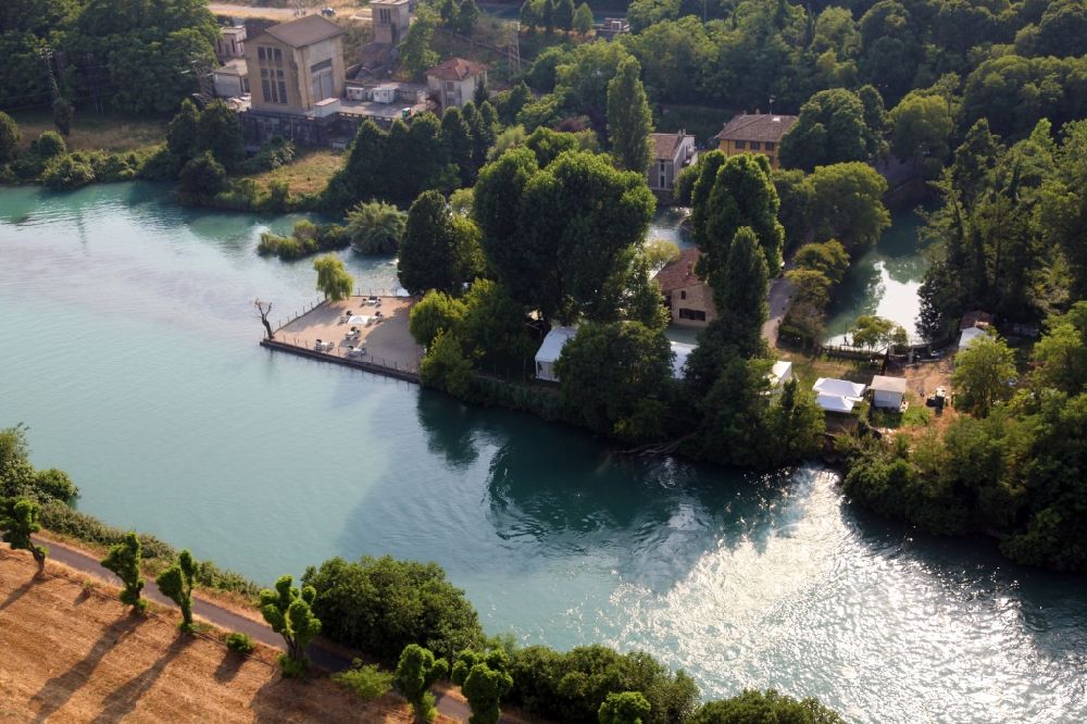 Aerial image Marmirolo - Landscape of the Mincio with a restaurant on river course in Lobardy, Italy