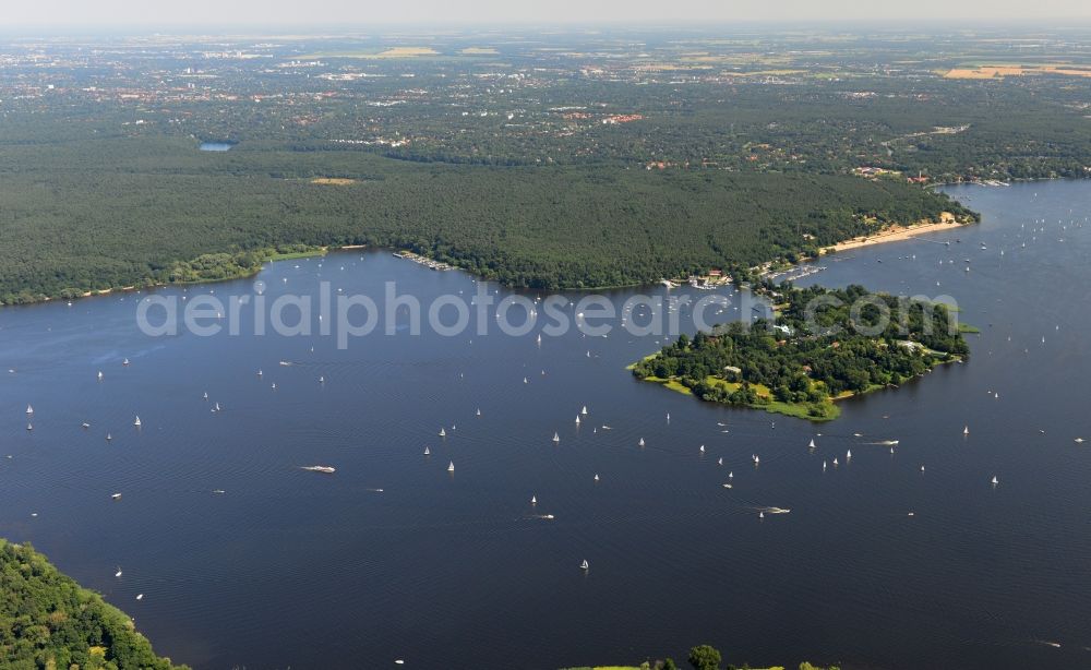 Berlin from above - Landscape along the river banks of the Wannsee Grunewald in the district of Charlottenburg-Wilmersdorf in Berlin. Also pictured the island Schwanenwerder