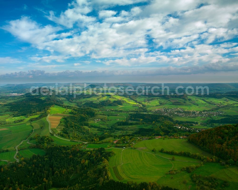 Göppingen from above - Landscape in the county district of Göppingen in the state of Baden-Württemberg. Acres, fields, forests and greens are covered by clouds and lie in the sun. The region is in the outland of the Schwäbische Alb area. The region is well known as a recreational area and for its hiking tracks and rock climbing sites