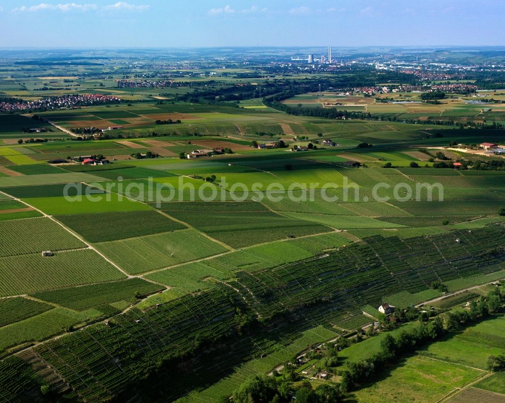 Aerial photograph Lauffen am Neckar - Landscape in the North of Lauffen am Neckar in the state of Baden-Wuerttemberg. The landscape is characterised by agricultural spaces, fields and terraces along the river Neckar which takes its course to the North and the city of Heilbronn. The stone coal power plant of Heilbronn - owned by the EnBW Kraftwerke AG company - is located in the background