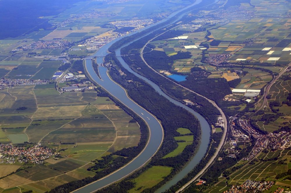 Bad Bellingen from above - Landscape in the lowland of the Upper Rhine plain with course of the Grand Canal d'Alsace, the river Rhine and motorway A5 at Bad Bellingen in the state Baden-Wurttemberg, Germany. Border region at Hombourg, Alsace, France, left, and Germany on the right hand side