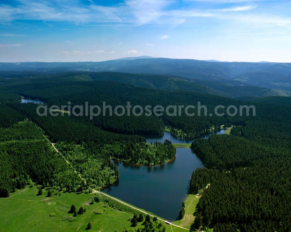 Clausthal-Zellerfeld from above - Landscape and ponds at Clausthal-Zellerfeld in the state of Lower Saxony. The borough is located on the Oberharz high plateau. It is surrounded by several ponds and creeks of the Upper Harz Water Regale. View from the village over the artificial pond Hirschler Teich towards the East