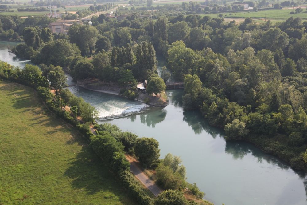 Marmirolo from above - Landscape of the of Mincio with a restaurant on river course in Lobardy, Italy