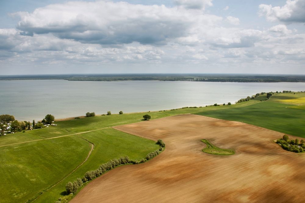 Aerial image Ludorf - Landscape plowed fields with island-shaped tree and shrub vegetation in Ludorf in Mecklenburg - West Pomerania