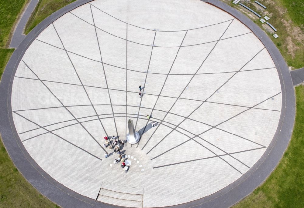 Aerial image Herten - The stainless steel obelisk serves as a pointer to the horizontal sundial, located on the heap dump Hoheward, a landscape park in Herten in the Ruhr area in North Rhine-Westphalia