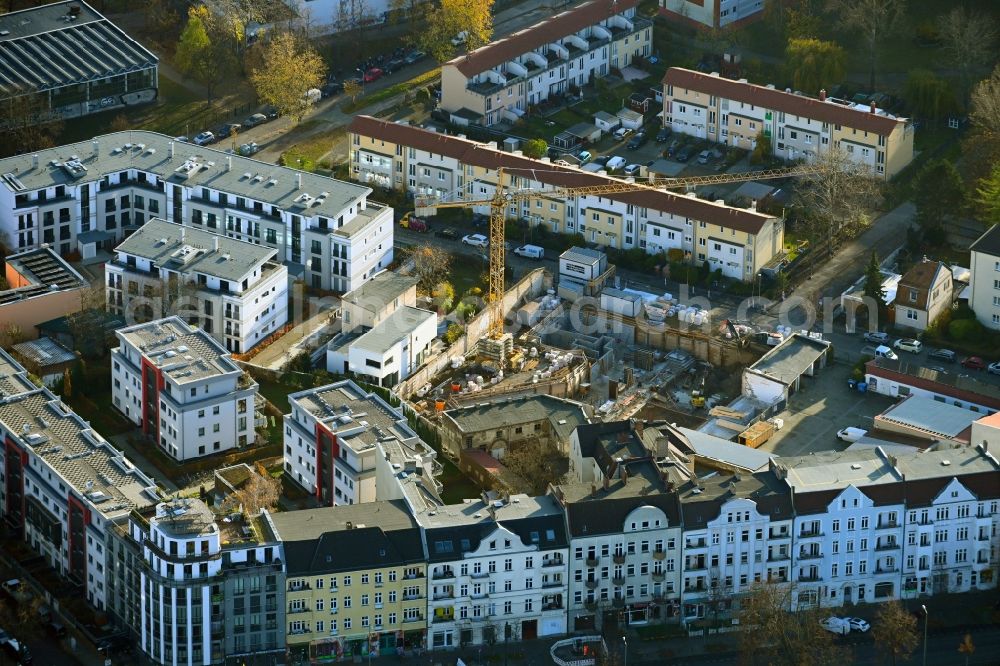 Aerial image Berlin - Construction site for the construction of gaps along the multi-family house residential housing estate on Berkenbruecker Steig in the district Hohenschoenhausen in Berlin, Germany