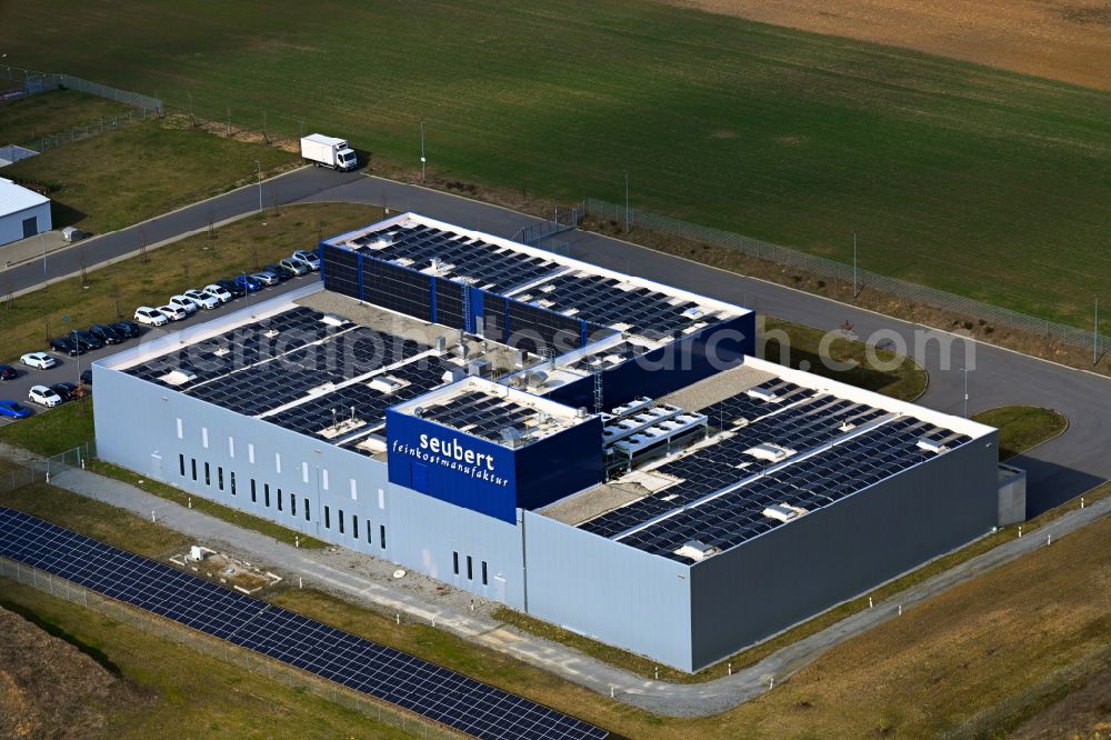 Gerchsheim from above - Buildings and production halls on the food manufacturer's premises of Seubert Feinkostmanufaktur GmbH & Co KG on street Am Berg in Gerchsheim in the state Baden-Wuerttemberg, Germany