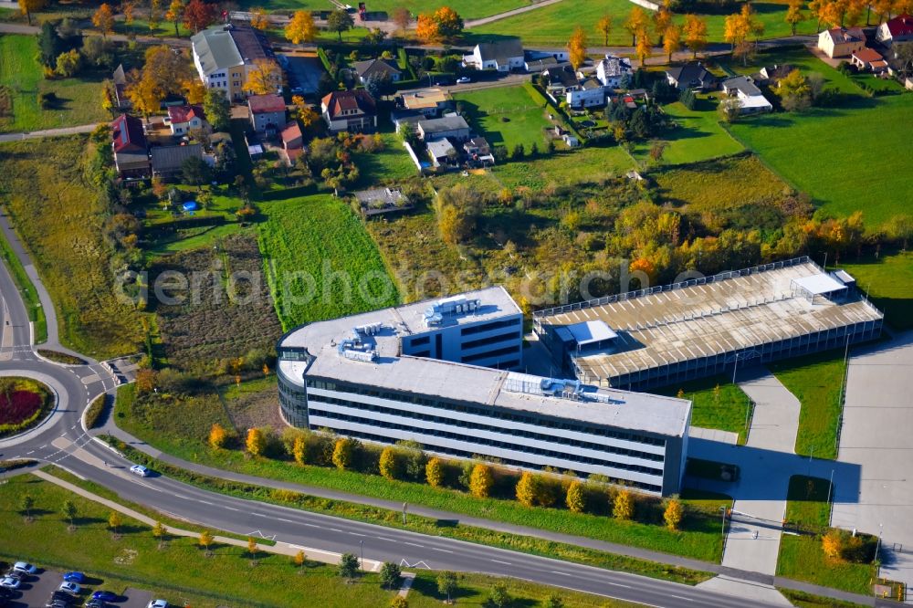 Selchow from above - Empty, unused building and multi-storey car park of the air Berlin technology of centre in Selchow in the federal state Brandenburg, Germany. A project of the J. B. Harder Verwaltung GmbH & Co. KG
