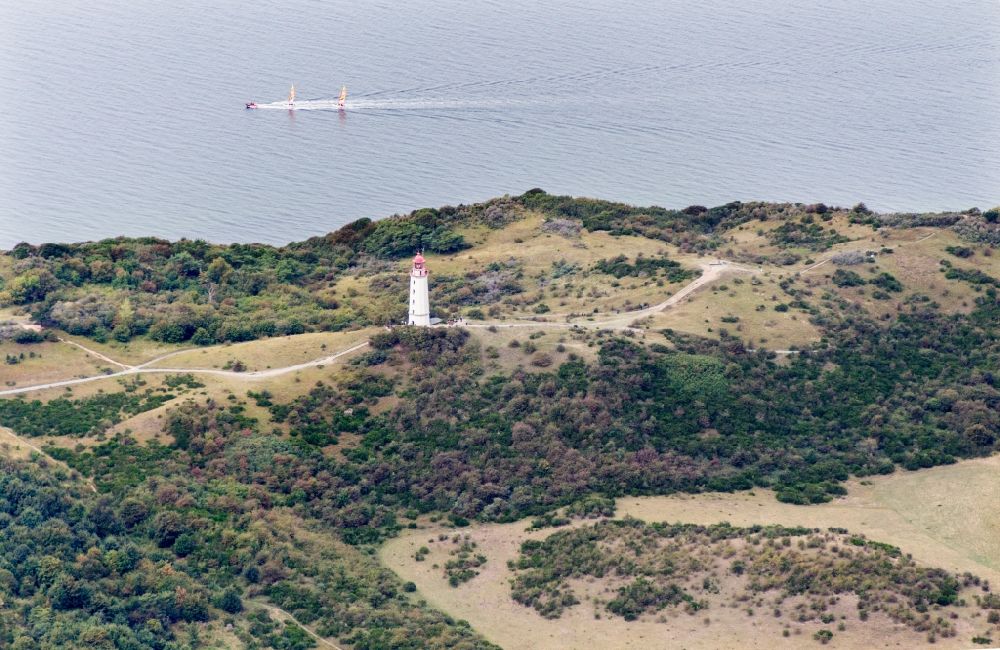 Insel Hiddensee from the bird's eye view: Lighthouse as a historic seafaring character Im Dornbuschwald on island Insel Hiddensee in the state Mecklenburg - Western Pomerania, Germany