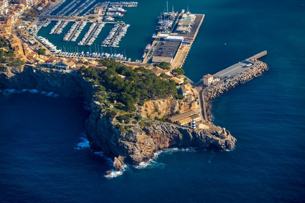 Soller from the bird's eye view: Lighthouse as a historic seafaring character in the coastal area Balearic Sea in Soller in Balearic Islands, Spain