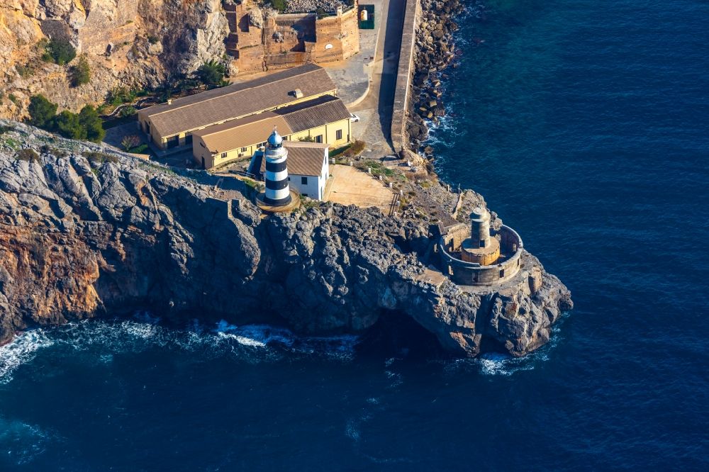 Aerial image Soller - Lighthouse as a historic seafaring character in the coastal area Balearic Sea in Soller in Balearic Islands, Spain