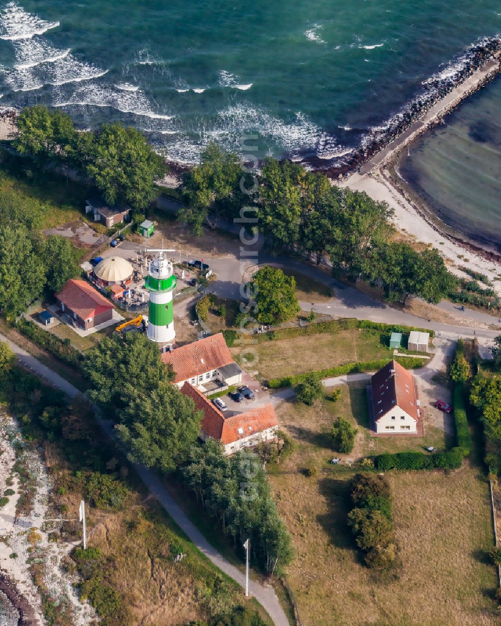 Aerial image Strande - Lighthouse as a historic seafaring character in the coastal area Buelk on street Buelker Weg in Strande in the state Schleswig-Holstein, Germany
