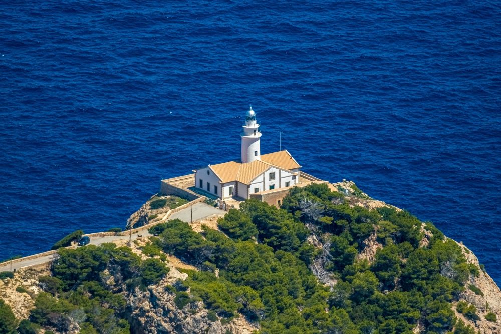 Capdepera from the bird's eye view: Lighthouse as a historic seafaring character in the coastal area Faro de Capdepera on Carrer de sa Comassa in Capdepera in Balearic island of Mallorca, Spain