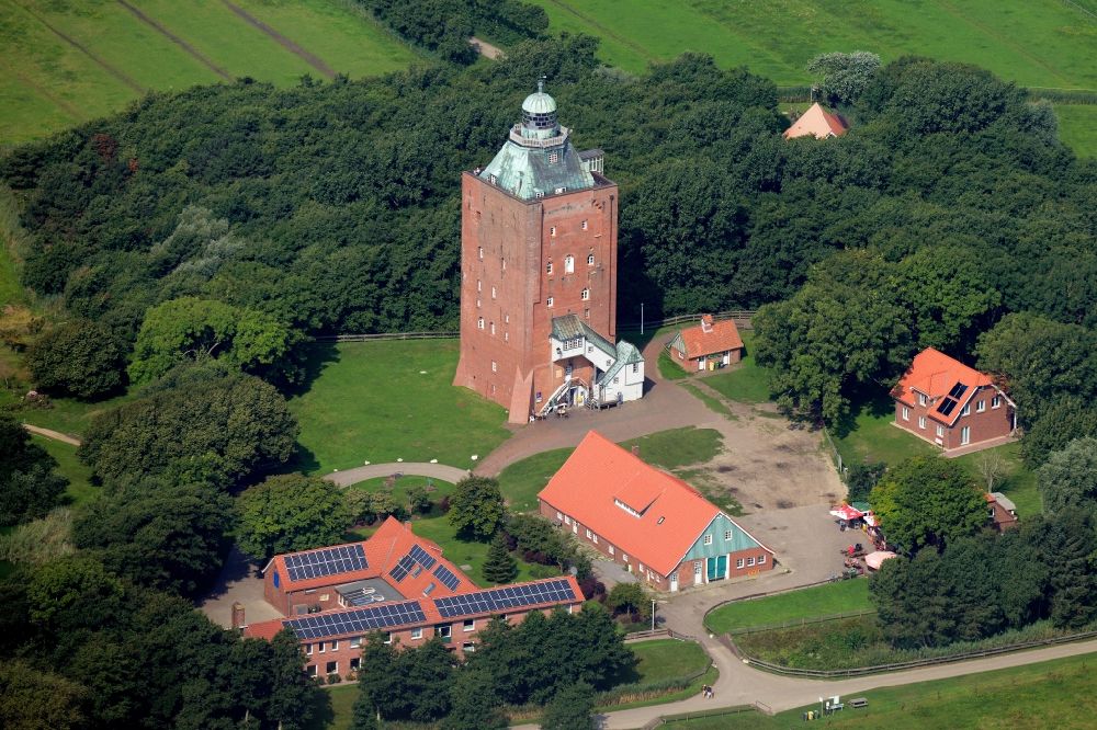 Hamburg from the bird's eye view: Lighthouse as a historic seafaring character in the coastal area of Nort Sea island Neuwerk in Hamburg in Germany
