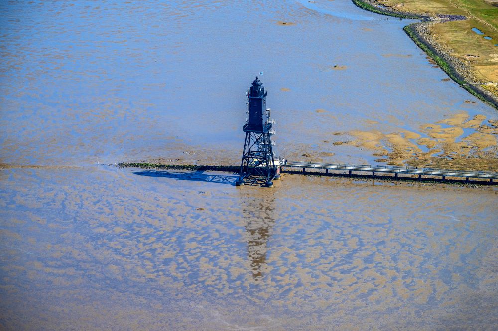 Wurster Nordseeküste from above - Lighthouse as a historic seafaring character in the coastal area of North Sea in the district Dorum in Wurst Nordseekueste in the state