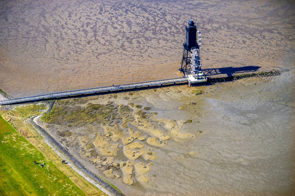 Aerial image Wurster Nordseeküste - Lighthouse as a historic seafaring character in the coastal area of North Sea in the district Dorum in Wurst Nordseekueste in the state