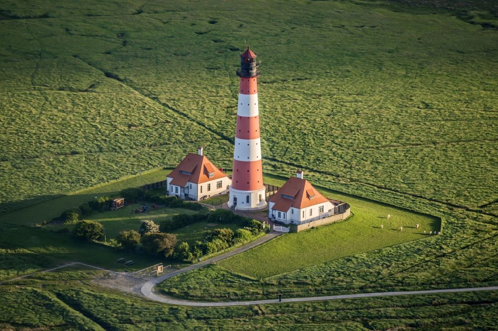 westerhever from the bird's eye view: Lighthouse as a historic seafaring character in the coastal area of North Sea in the district Hauert in Westerhever in the state Schleswig-Holstein