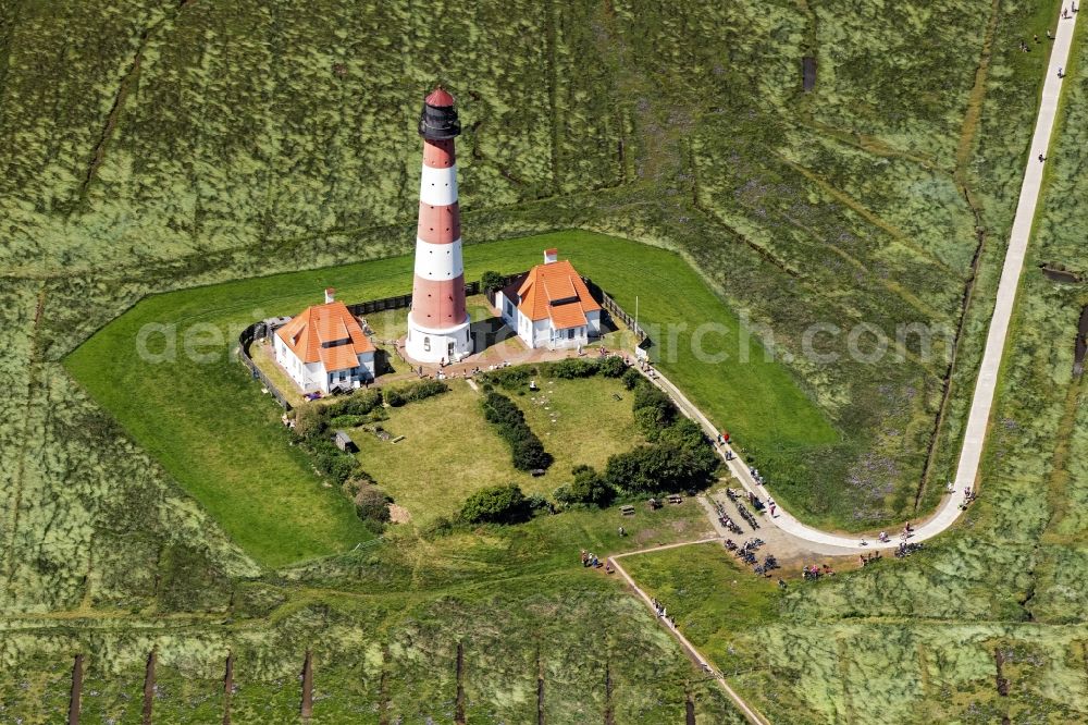 Aerial photograph Westerhever - Lighthouse as a historic seafaring character in the coastal area of North Sea in the district Hauert in Westerhever in the state Schleswig-Holstein