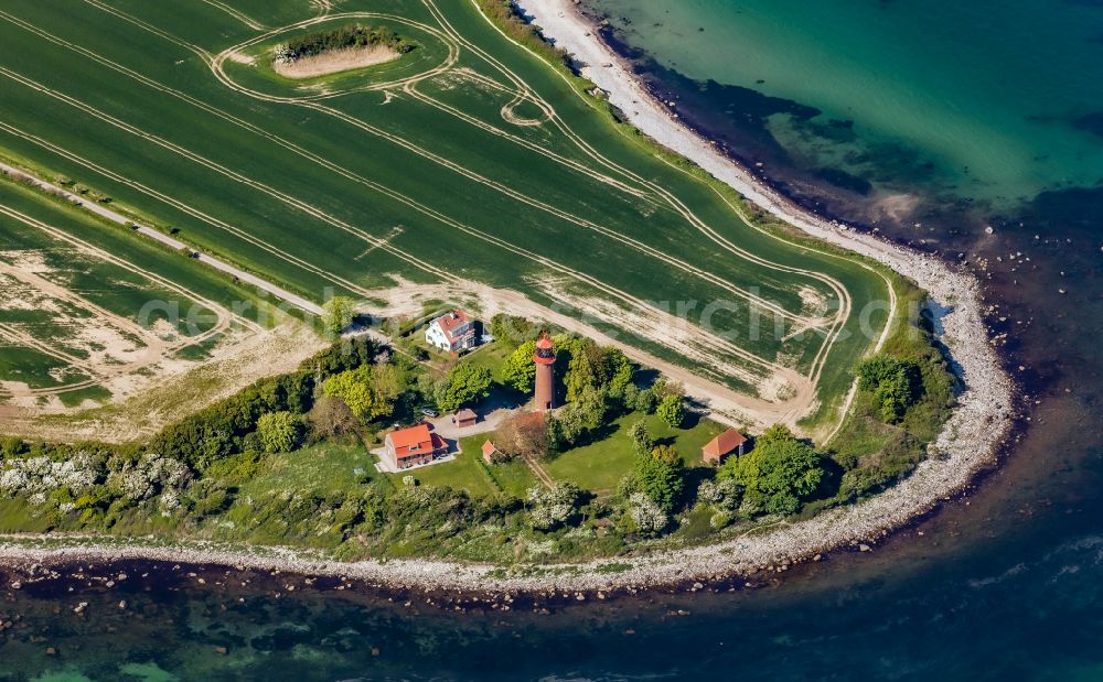 Fehmarn from the bird's eye view: Lighthouse as a historic seafaring sign in the Staberhuk coastal area in the south-east of the island of Fehmarn in Fehmarn in the state Schleswig-Holstein, Germany