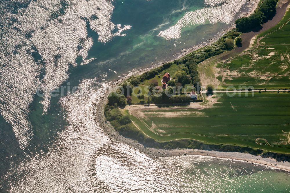 Aerial image Fehmarn - Lighthouse as a historic seafaring sign in the Staberhuk coastal area in the south-east of the island of Fehmarn in Fehmarn in the state Schleswig-Holstein, Germany