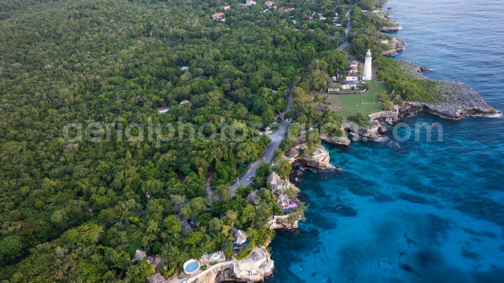 West End from above - Lighthouse as a historic seafaring character in the coastal area West End Lighthouse in West End in Westmoreland Parish, Jamaica