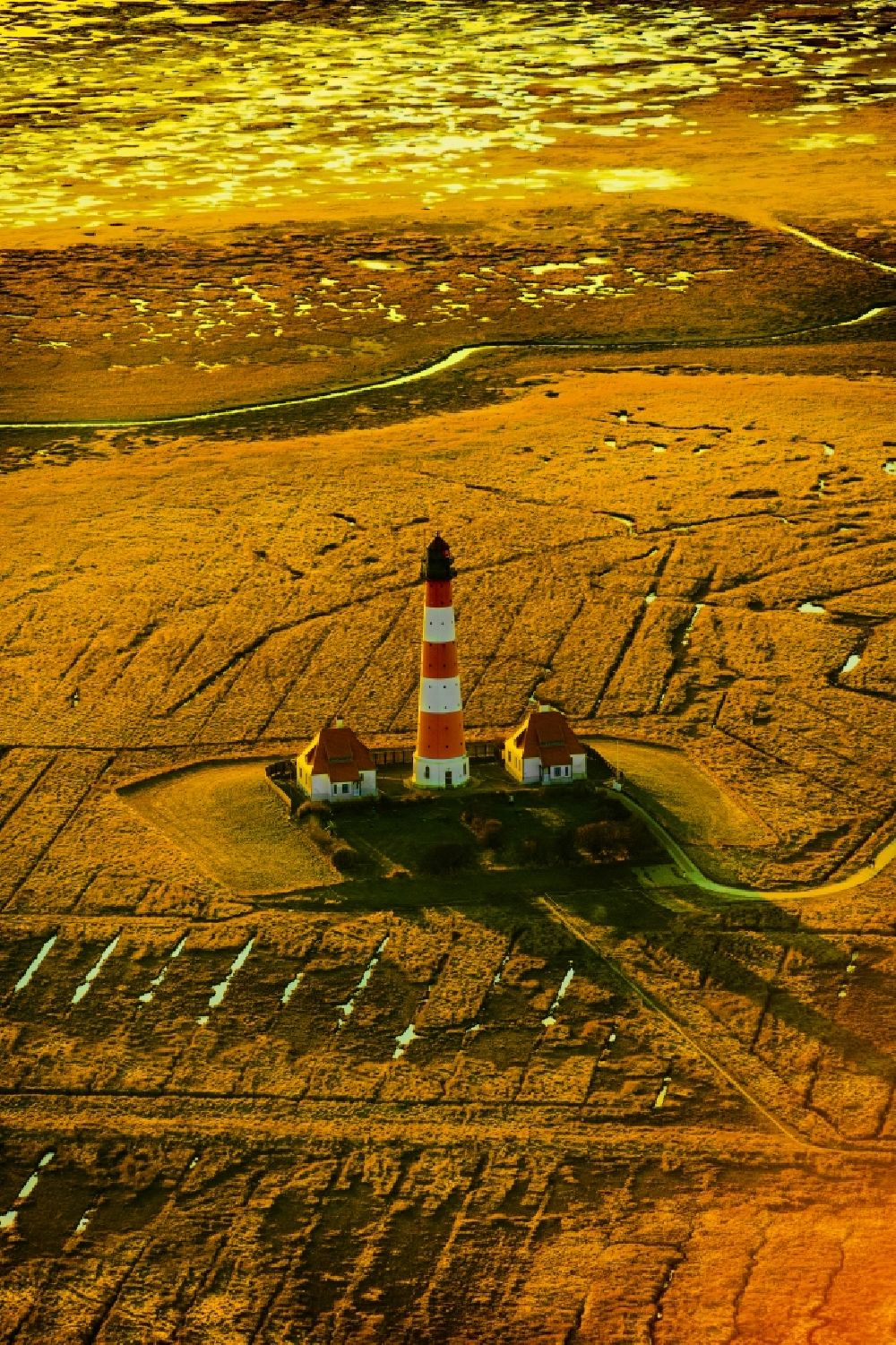 Aerial photograph Tating - Lighthouse as a historical navigation sign in the coastal area Westerheversand in the district of Hauert in Westerhever in the federal state Schleswig-Holstein