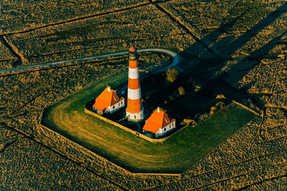 Aerial photograph Tating - Lighthouse as a historical navigation sign in the coastal area Westerheversand in the district of Hauert in Westerhever in the federal state Schleswig-Holstein