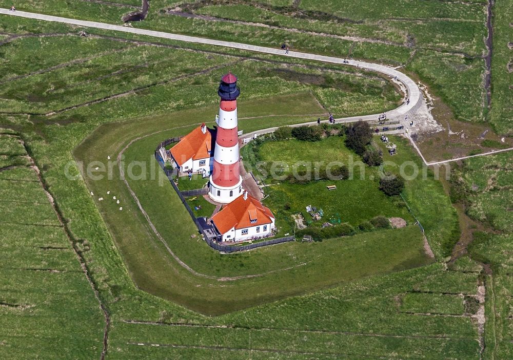 Westerhever from the bird's eye view: Lighthouse as a historical navigation sign in the coastal area Westerheversand in the district of Hauert in Westerhever in the federal state Schleswig-Holstein