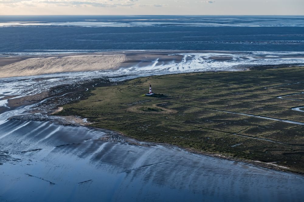 Tating from the bird's eye view: Lighthouse as a historical navigation sign in the coastal area Westerheversand in the district of Hauert in Westerhever in the federal state Schleswig-Holstein
