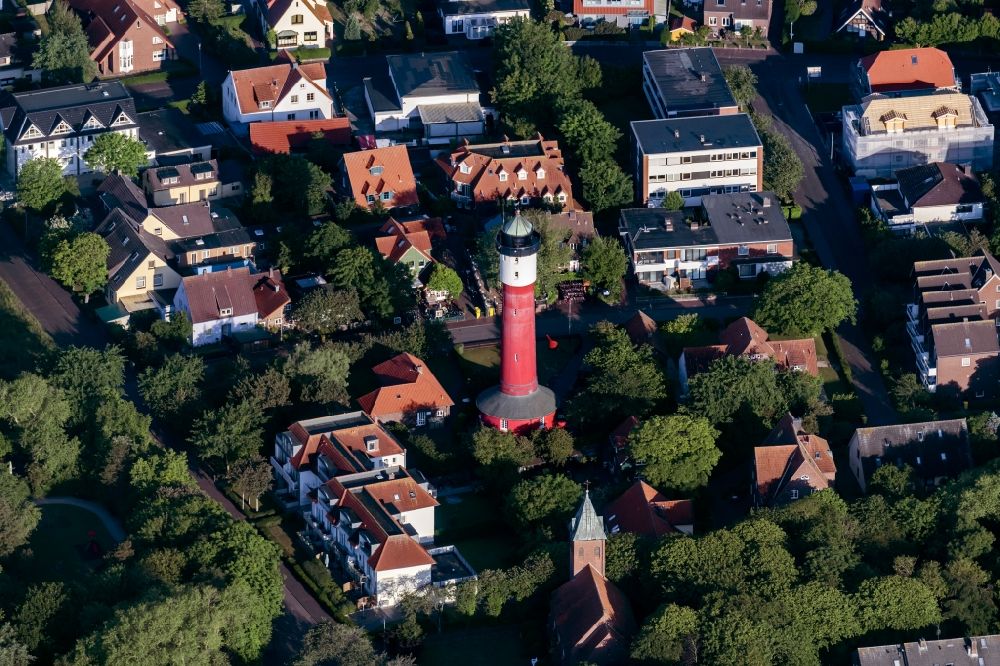 Wangerooge from above - Lighthouse as a historic seafaring character in Wangerooge in the state Lower Saxony, Germany