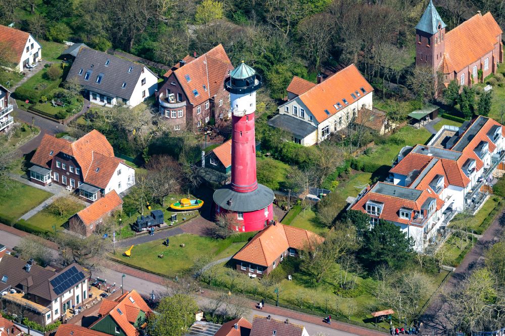 Aerial image Wangerooge - Lighthouse as a historic seafaring character in Wangerooge in the state Lower Saxony, Germany
