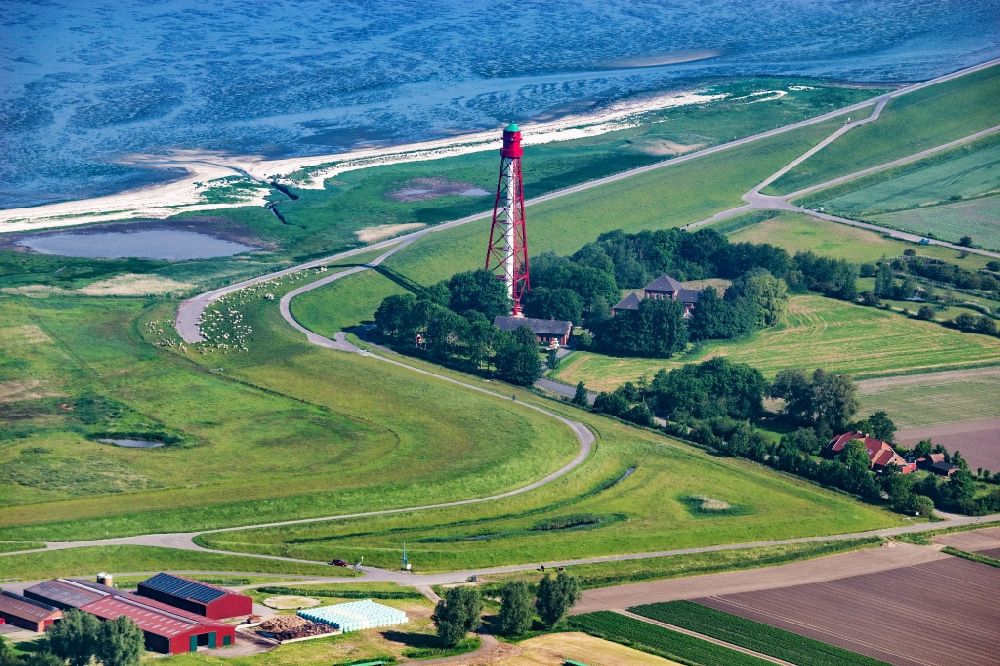 Aerial photograph Krummhörn - Lighthouse as a historic seafaring character Campener Leuchtturm in Krummhoern in the state Lower Saxony, Germany