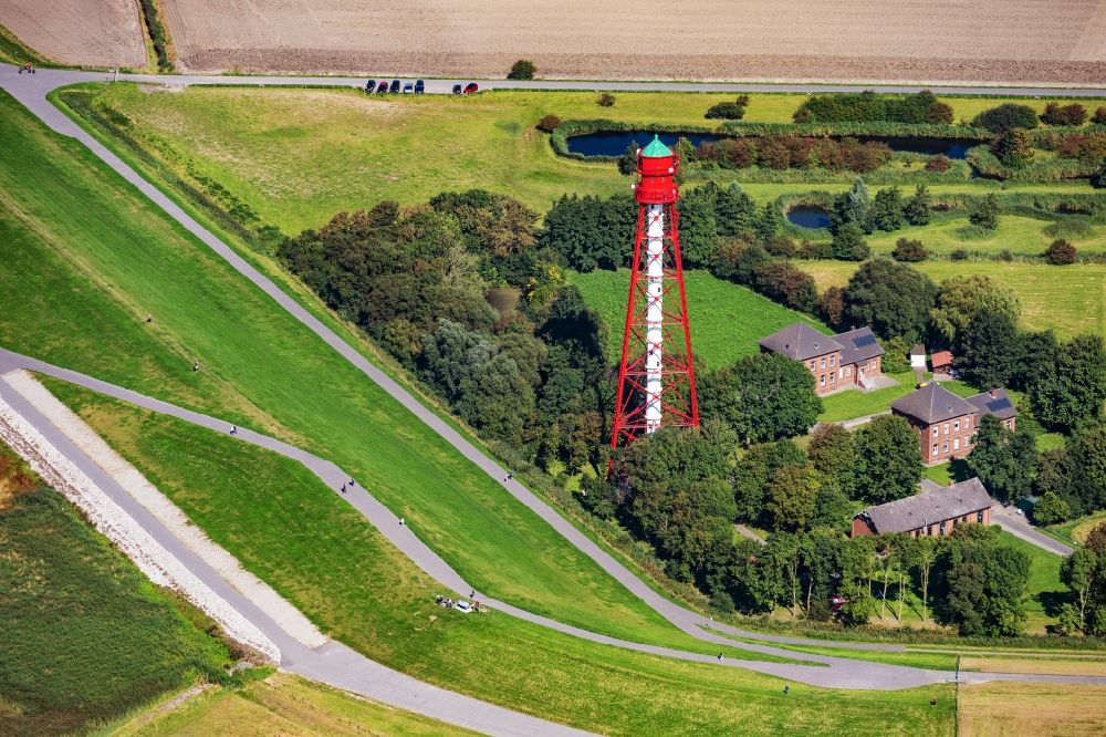 Krummhörn from above - Lighthouse as a historic seafaring character Campener Leuchtturm in Krummhoern in the state Lower Saxony, Germany