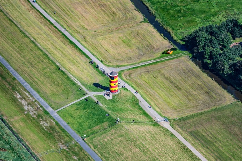 Aerial photograph Krummhörn - Lighthouse as the historical nautical sign Pilsum lighthouse in Krummhorn in the state Lower Saxony, Germany