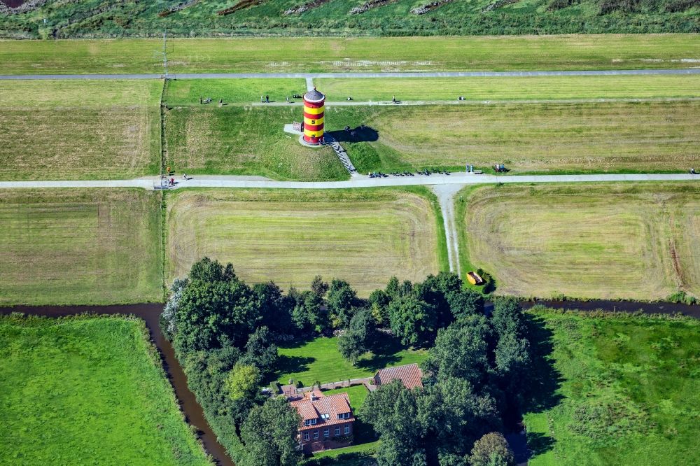 Aerial image Krummhörn - Lighthouse as the historical nautical sign Pilsum lighthouse in Krummhorn in the state Lower Saxony, Germany