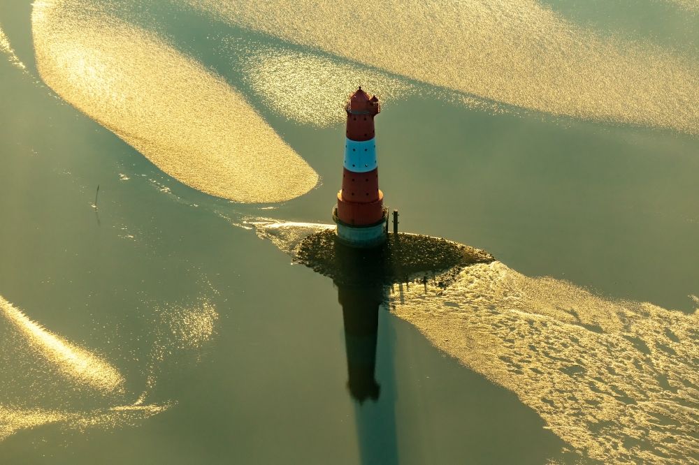 Wilhelmshaven from the bird's eye view: Lighthouse Arngast a maritime sign in the Jadebusen South of Wilhelmshaven on a sandbank in the watt during sunrise in Lower Saxony Germany