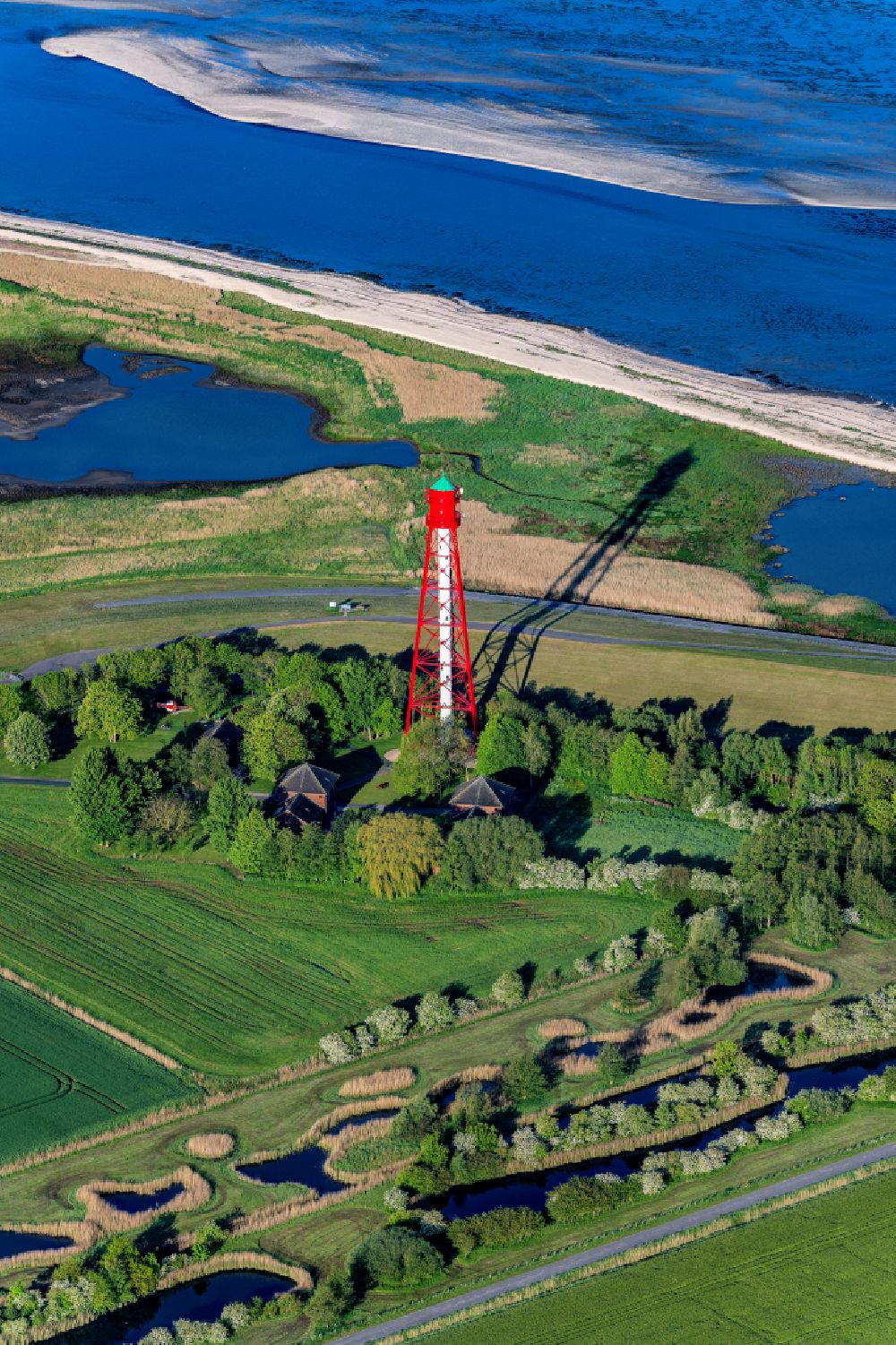 Aerial image Krummhörn - Lighthouse as a historic seafaring character Campener Leuchtturm in Krummhoern in the state Lower Saxony, Germany