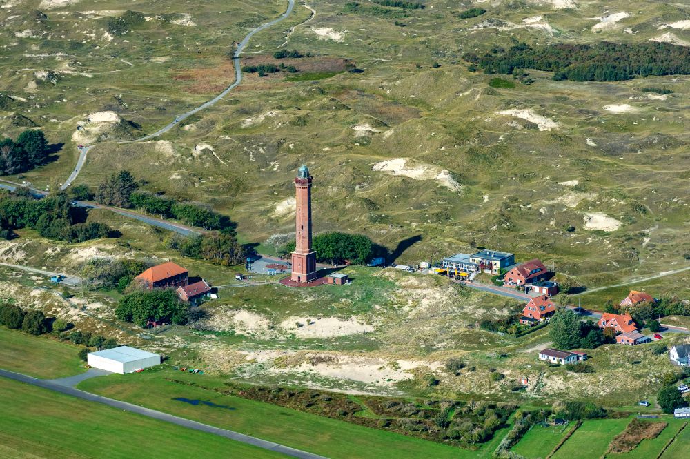 Norderney from above - Illuminated tower in the dunes of the island of Norderney in Lower Saxony