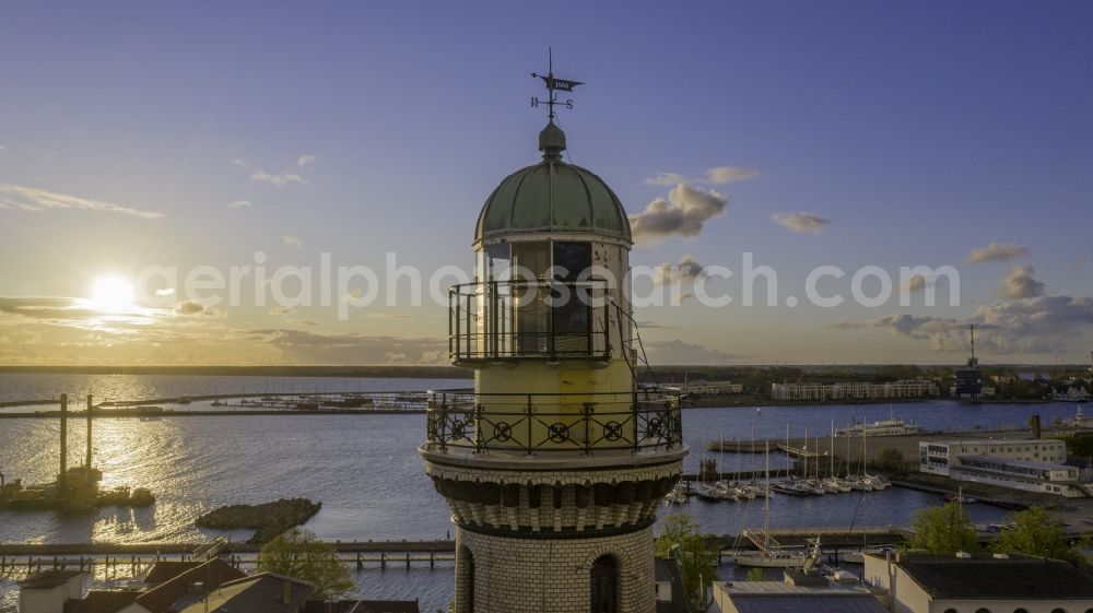 Aerial photograph Rostock - Lighthouse as a historic seafaring character in the coastal area of Baltic Sea in the district Warnemuende in Rostock in the state Mecklenburg - Western Pomerania, Germany