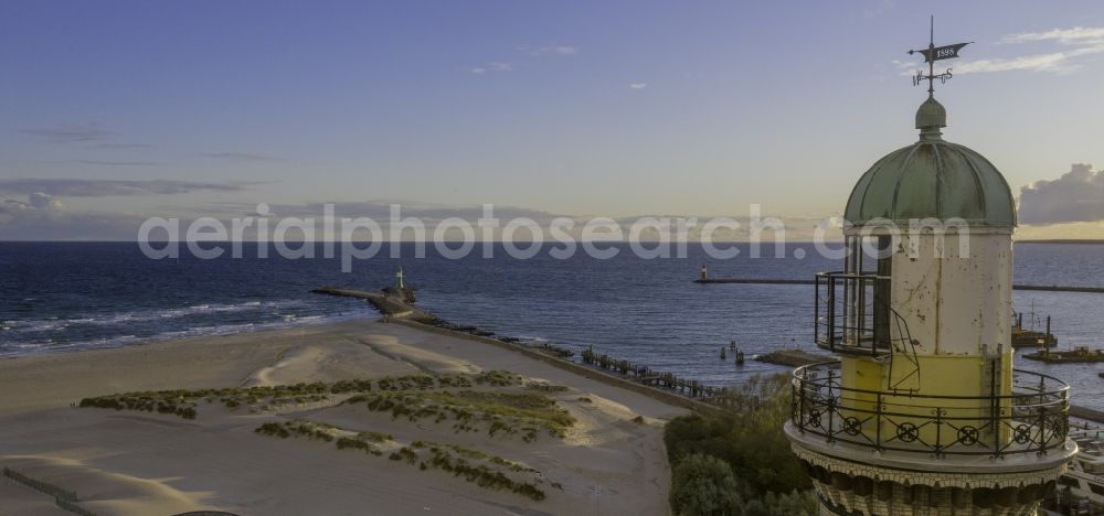 Aerial image Rostock - Lighthouse as a historic seafaring character in the coastal area of Baltic Sea in the district Warnemuende in Rostock in the state Mecklenburg - Western Pomerania, Germany