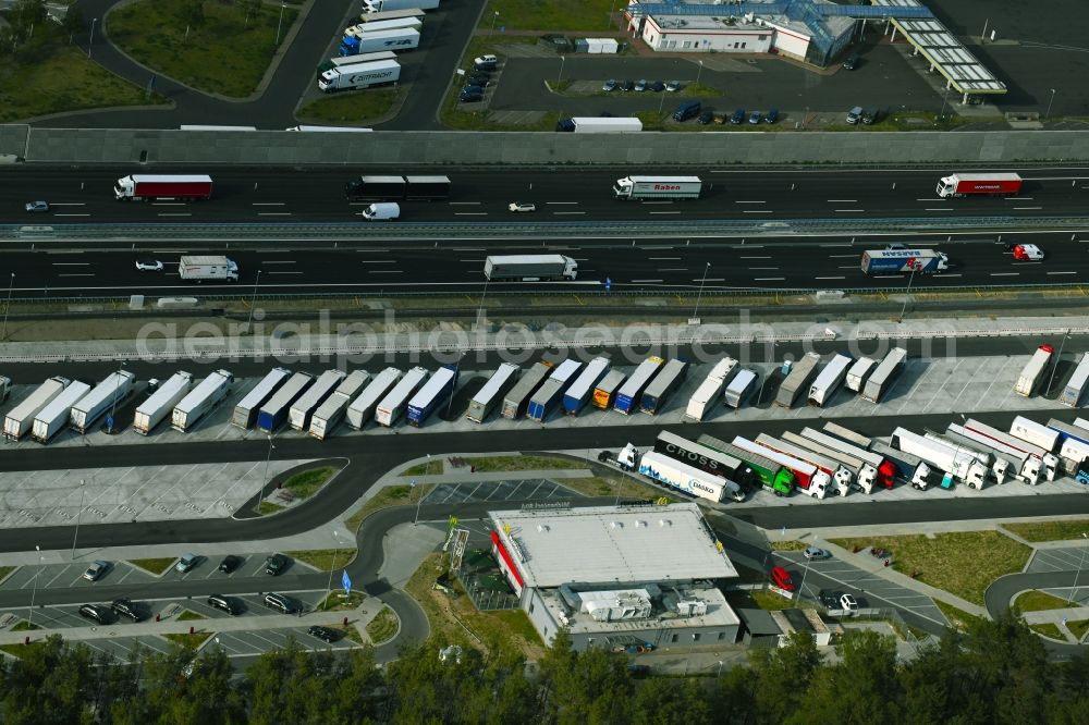 Aerial image Michendorf - Lorries - parking spaces at the highway rest stop and parking of the BAB A 10 in Michendorf in the state Brandenburg, Germany