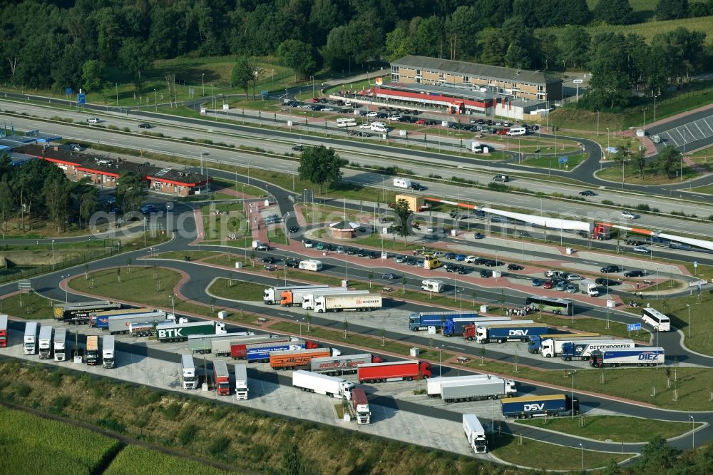 Aerial image Bispingen - Lorries - parking spaces at the highway rest stop and parking of the BAB A 7 E45 on Raststaette Brunautal West in Bispingen in the state Lower Saxony