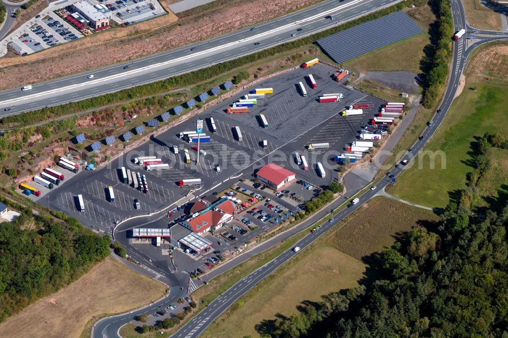 Wertheim from the bird's eye view: Lorries - parking spaces at the highway rest stop and parking of the BAB A 3 in Wertheim in the state Baden-Wurttemberg, Germany