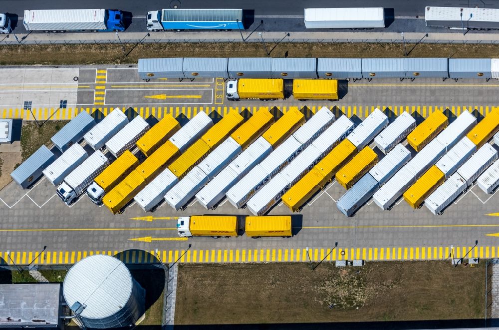 Dortmund from the bird's eye view: Lorries and Truck storage areas and free-standing storage on grounds of logistic center Amazon in the district Westfalenhuette in Dortmund in the state North Rhine-Westphalia, Germany