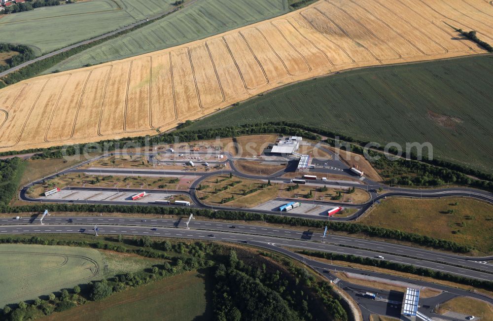 Aerial image Geraberg - Lorries - parking spaces at the highway rest stop and parking of the BAB A A71 Serways Raststaette Thueringer Wald Nord in Geraberg in the state Thuringia, Germany