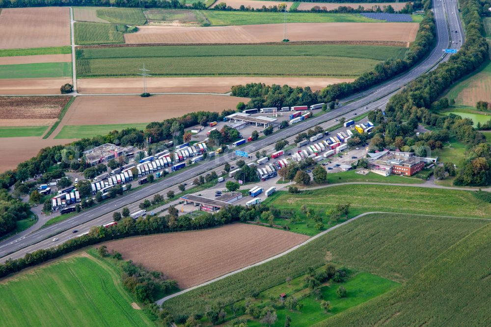 Aerial image Ilsfeld - Lorries - parking spaces at the highway rest stop and parking Serways Raststaette Wunnenstein of the Motorway A81 in Ilsfeld in the state Baden-Wuerttemberg, Germany