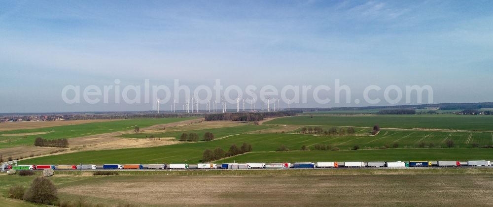 Aerial photograph Güldendorf - Lorries crowded in traffic jams in the lanes of the route of the motorway BAB A12 in Gueldendorf in the state Brandenburg, Germany